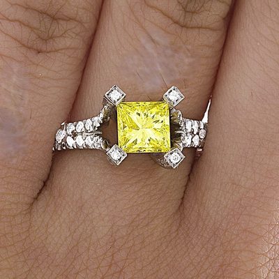 GIA Certified 1.60 CT Fancy Intense Yellow - Platinum & Round Cut Side Ring