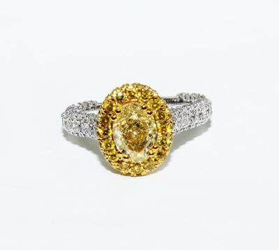 GIA Certified 3.30 Carat Fancy Yellow Oval Cut Diamond 18k Engagement Ring