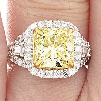 GIA Certified 4 CT Fancy Yellow Cushion Cut Diamond Ring with Round & Baguettes