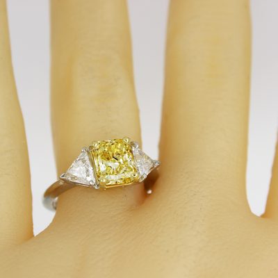 GIA Certified Fancy Yellow Cushion Cut Three-Stone Diamond Ring - Triangle Sides