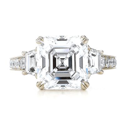 GIA Certified Asscher Cut Diamond Ring with Trapezoid and Round Shape Sides.