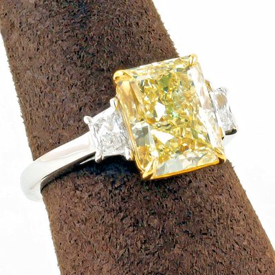 Rare Platinum GIA Certified 6.00 CT Fancy Yellow Radiant with Side Trapezoids