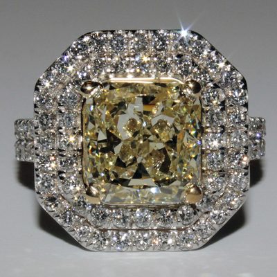 Amazing Doble Halo Round Shape 2.75 CTW Radiant cut Diamond Fancy Yellow 18K